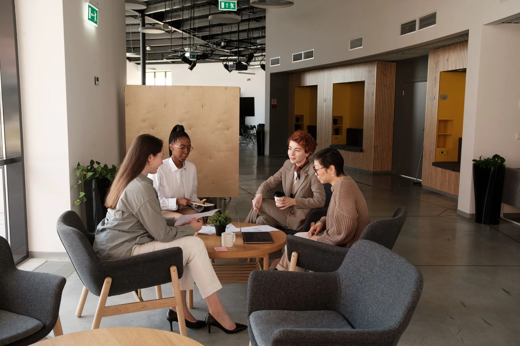 Colleagues working across a modern open workplace